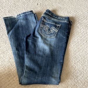 Ladies Rerock Boot cut jeans. Slight wear on bottom of one leg see pic. Size 10R